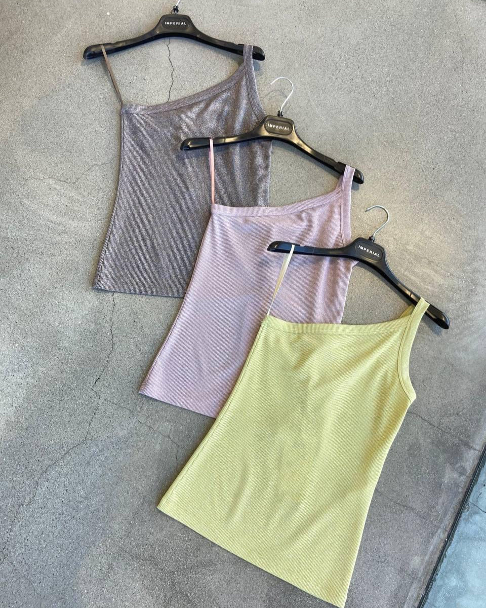 Three camisole tops in gray, pink, and yellow colors, displayed on hangers.